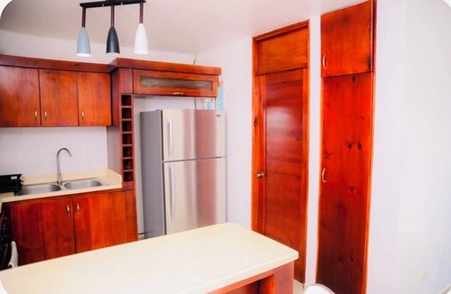 Punal Apartment | “ Enjoy Your Coffee with Poolside Views at Harmony II – Balcony Bliss"
