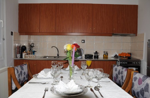 Loutraki Apartment | Enora Loutraki! Stylish 2BR Retreat with private Garden near the Sea.