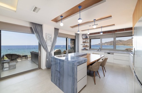 Koutsouras Condo | Exclusive beachfront penthouse retreat with private hot tub