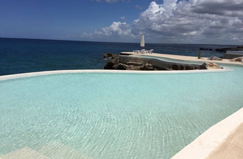 Dominicus Apartment | FRONT CARIBBEAN OCEAN , APARTMENT WITH GARDEN & POOLS & OCEAN ENTRYS