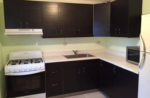 El Batey Apartment | Guest-Friendly 2-bedroom top-floor condo with pool in the center of Sosua