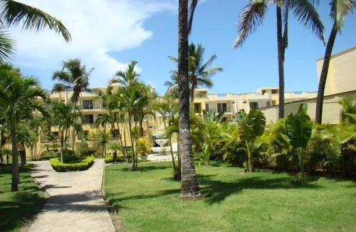 El Batey Apartment | Guest-Friendly 2-bedroom top-floor condo with pool in the center of Sosua