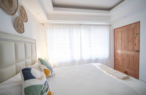 Villas Ana Maria Hotel | Guest-Friendly DR Suite: Walk to Sand, Clubs & Dining—Affordable!