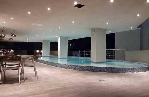 La Julia Apartment | Hermosas vistas del centro, para Vacacionar o Trabajar.nPiscina, Terraza, Gym.
