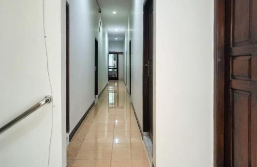 Waru House | Hotel Prisma Mitra RedDoorz