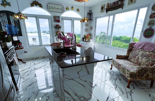 Cabrera Apartment | Huge penthouse suite w/kitchen, sunroom, & soaking tub on a private balcony!