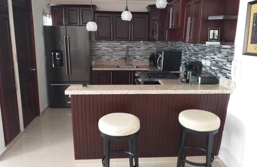 Gregorio Luperon Apartment | Just like home but better, residential Harmony