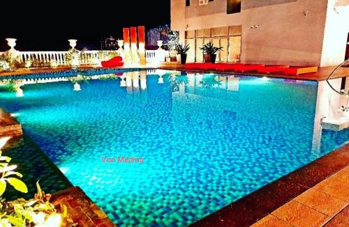 Mandurriao Apartment | Lafayette Park Square with balcony facing pool view
