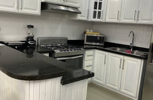 Gregorio Luperon Apartment | Lovely and cozy home with pool and GYM. Located near major Bars and Restaurants