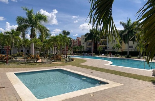 Gregorio Luperon Apartment | Lovely and cozy home with pool and GYM. Located near major Bars and Restaurants