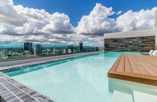 Downtown Santo Domingo Apartment | Lujoso Apartamento 5 Star ROOFTOP POOL & GYM 1BE -1 1/2 Ba