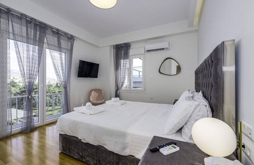Athens City Centre Apartment | Lush Sapphire apt. steps from the Acropolis!