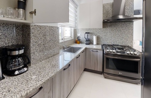 Ensanche Quisqueya House | Luxurious 2BR condo with Rooftop, jacuzzi and BBQ