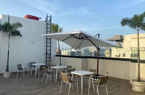 Ensanche Quisqueya Apartment | Luxurious Downtown Apt, Rooftop Pool, Gym