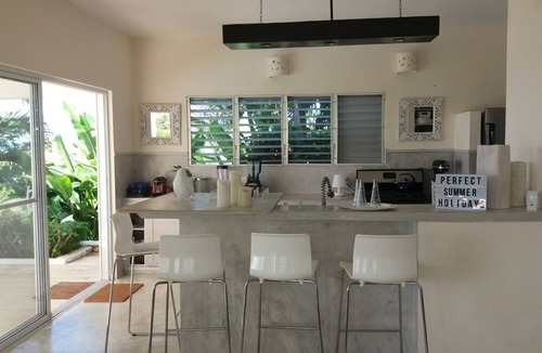 Rio San Juan Villa | Luxurious villa set in a vast tropical garden, with panoramic sea and nature views.