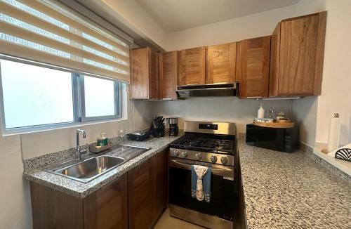 La Iglesia Apartment | Luxury 2 Bedroom Apartment, 1 Min Walk to Punta Popy Beach, Pool, AC, Fast WiFi, Las Terrenas