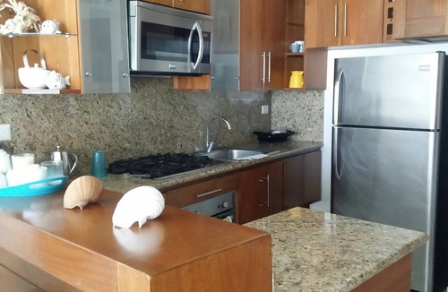 Sosua Apartment | Luxury condo on private sandy beach, with pool, A/C, internet, cable TV