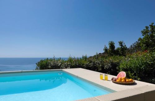 Steniai Villa | Luxury villa by the beach by Andros Villas Collection