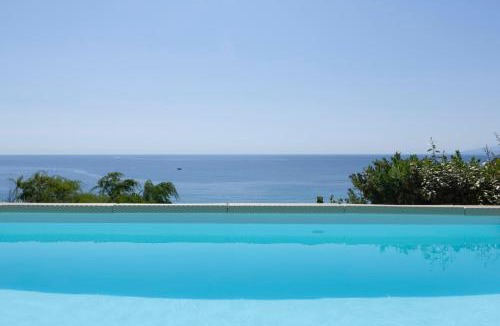 Steniai Villa | Luxury villa by the beach by Andros Villas Collection