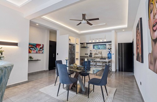El Batey Apartment | Modern 1BR at Rizz Suites Pool Access Walk to Beach King Bed Strong AC
