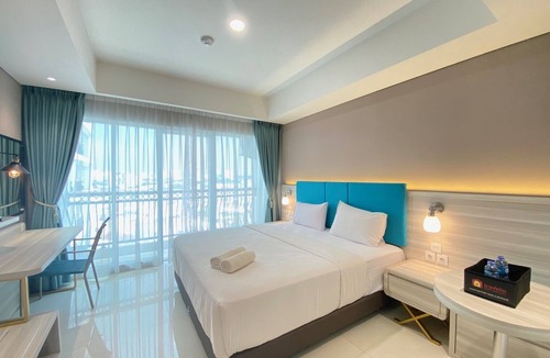 Malabar Apartment | Modern and Spacious Studio Room at Green Kosambi Apartment