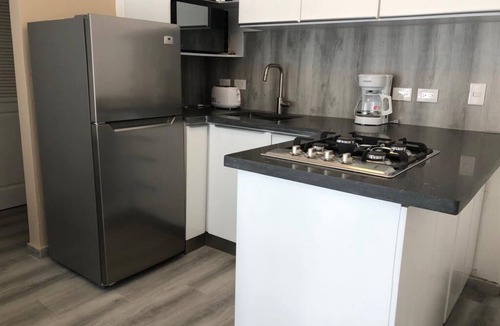 Cabarete Condo | Modern remodeled 1br/1ba condo steps from the beach!