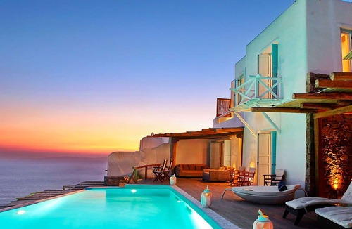 Faros Armenistis Villa | My Rental Homes - Queen Villa with pool area furnished with sunbeds and sea view