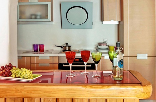 Faros Armenistis Villa | My Rental Homes - Queen Villa with pool area furnished with sunbeds and sea view