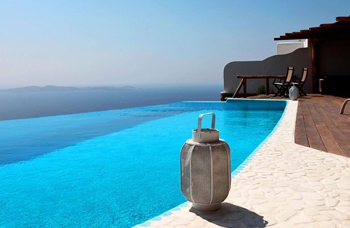 Faros Armenistis Villa | My Rental Homes - Queen Villa with pool area furnished with sunbeds and sea view