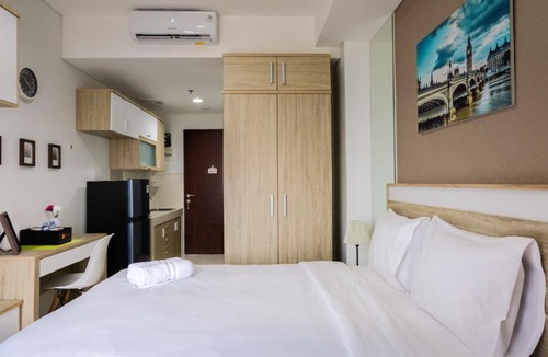 Pinang Apartment | New Studio Apartment at Springwood Residence By Travelio