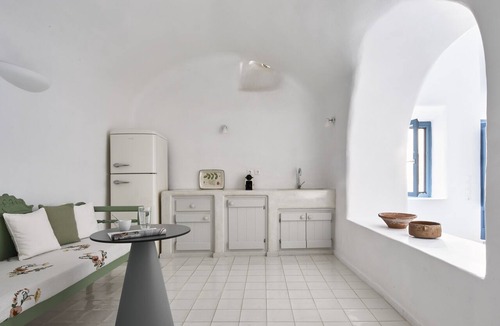 Pyrgos Apartment | Outdoor hot tub, Caldera and sunset views