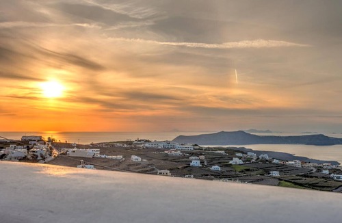 Pyrgos Apartment | Outdoor hot tub, Caldera and sunset views