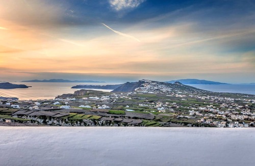 Pyrgos Apartment | Outdoor hot tub, Caldera and sunset views