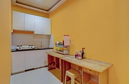 Renon Hotel | OYO 3856 Tizta Suites Bali