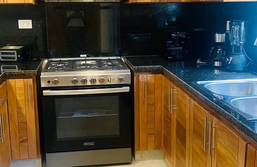 Urbanizacion Tavarez Apartment | Pool & parking in a 2BR/1BA gem – Steps to everything you need