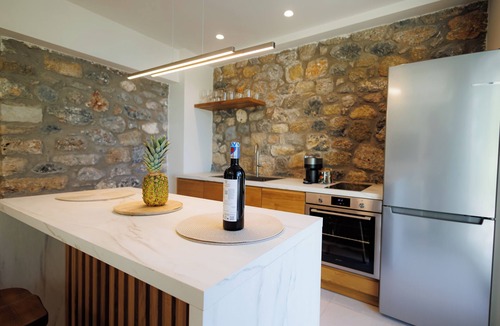 Paralia Vergas Villa | Potis Lower Suite - 2-bedroom suite with private patio