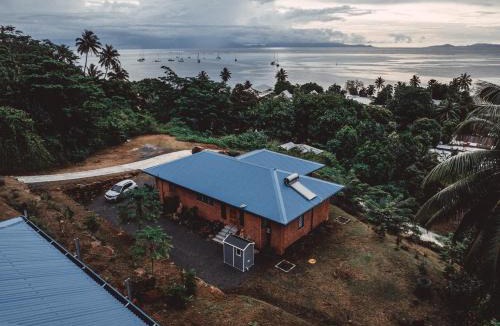 Fare Villa | Potter House VILLA PITA vue sur lagon et village de Fare