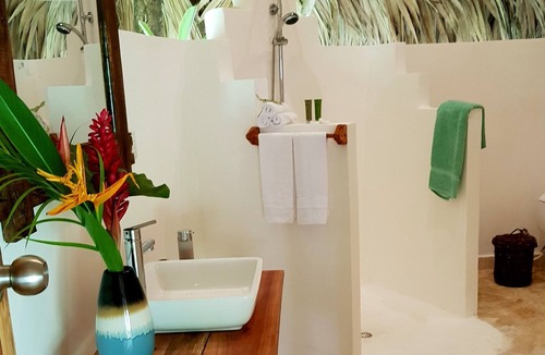 Samana Cabin | Regenerative tropical lodge with chic details , steps away from the beach.