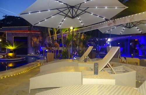 Playa Chiquita Apartment | Room + yummy breakfast, steps from casino/beach, guest-friendly, pool/TV/WiFi