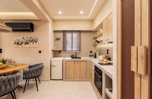 Peristeri Apartment | Rustic Boutique Retreat with Live Olive Tree, Parking and 1Gbps Fiber Internet