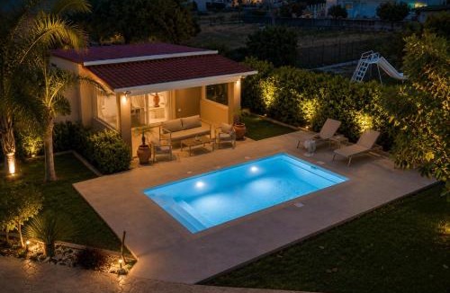 Petaloudes House | Sea Breeze & Nature villa, with heated pool and garden retreat