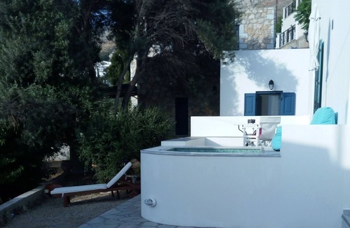 Kamari House | Sophie's Boutique Home - modern Greek house with outside Jacuzzi,