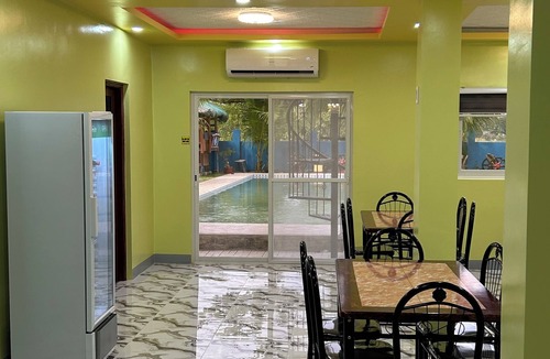 Bugallon Apartment | Spacious 9-bedroom apartment in lovely Bugallon with AC