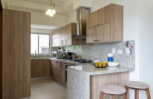 Ensanche Quisqueya Condo | Splendid-KingBed-3BR-Pool-AC-Modern-WiFi-Yellowkey