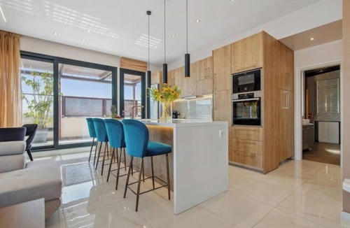 Glyfada Apartment | Starry Nights: Penthouse Sauna & Jacuzzi Serenade