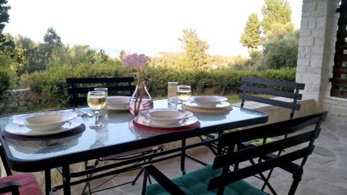 Evropouloi Apartment | Stone Studio in Nature with view to Corfu town!