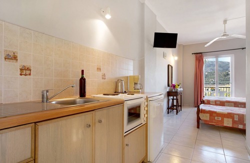 Limni Keri Apartment | Studio "Dolphin Studio Sea View 10" with Private Balcony, Shared Garden & Wi-Fi