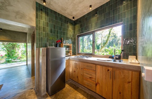 Sabaneta de Yasica Cabin | Stylish Jungle Cabin – Riverfront Retreat with Hammocks & Wi-Fi
