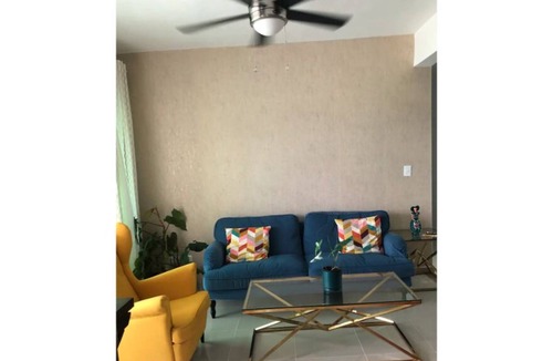 Licey al Medio Condo | Stylish Penthouse Suite with pool and views