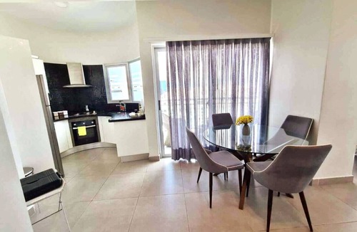 Downtown Santo Domingo Condo | Stylish, Upscale City Center Condo, Rooftop Terrace with Amazing City Views.
